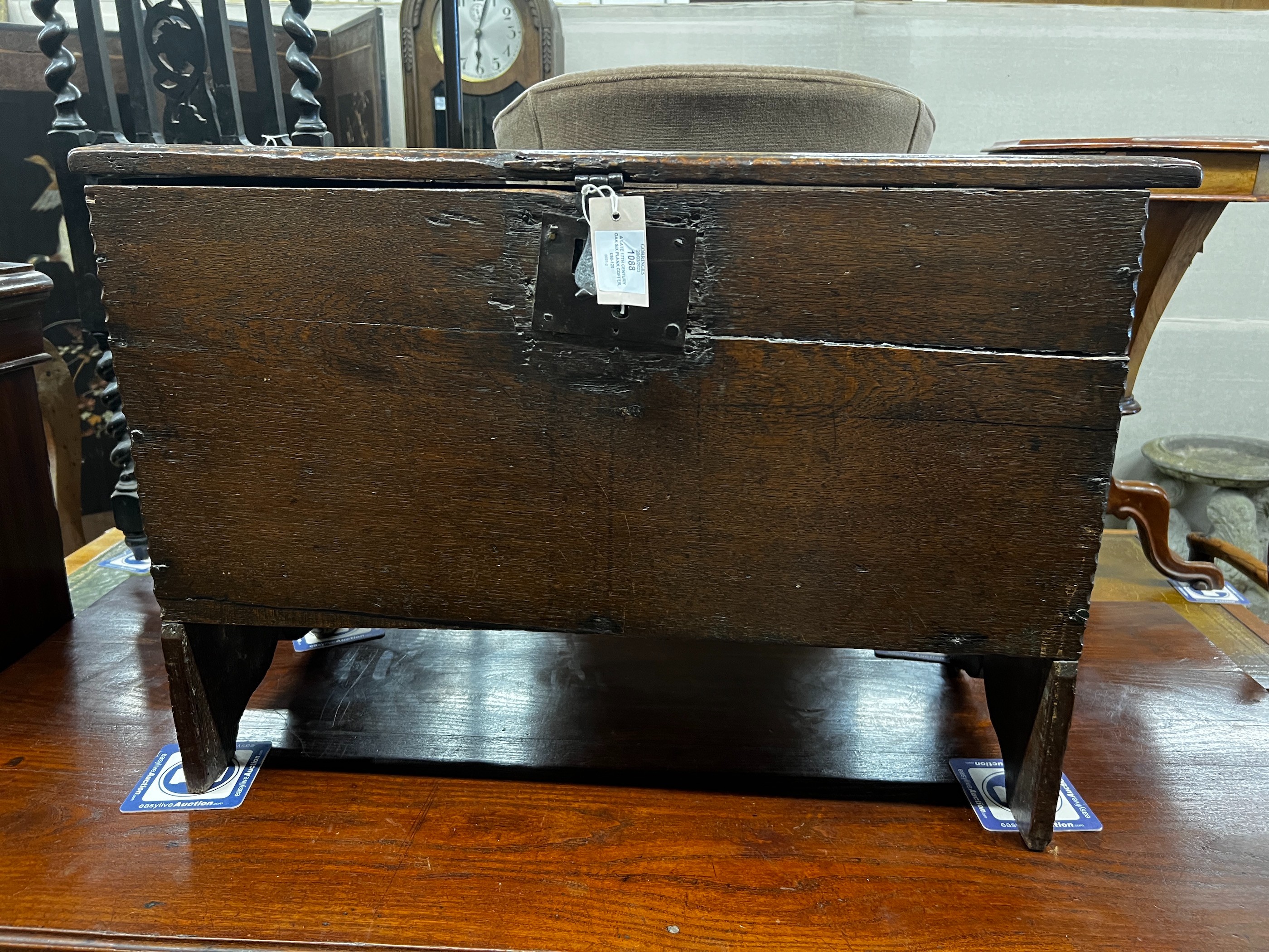 A late 17th century oak six plank coffer, length 73cm, depth 35cm, height 50cm